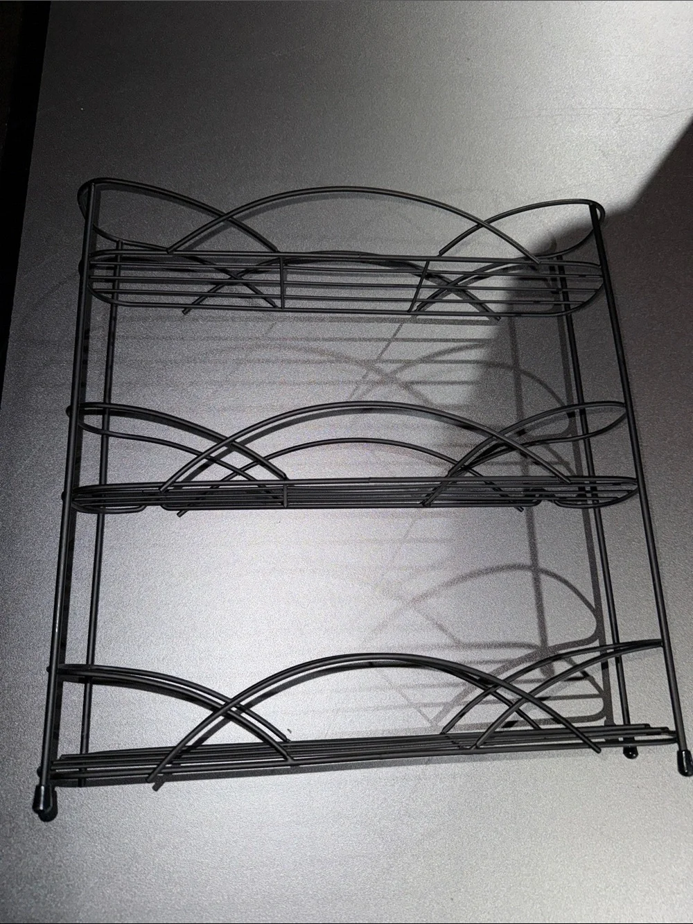 Black Metal 3-Tier Wall Display Shelf - Elegant Curved Design